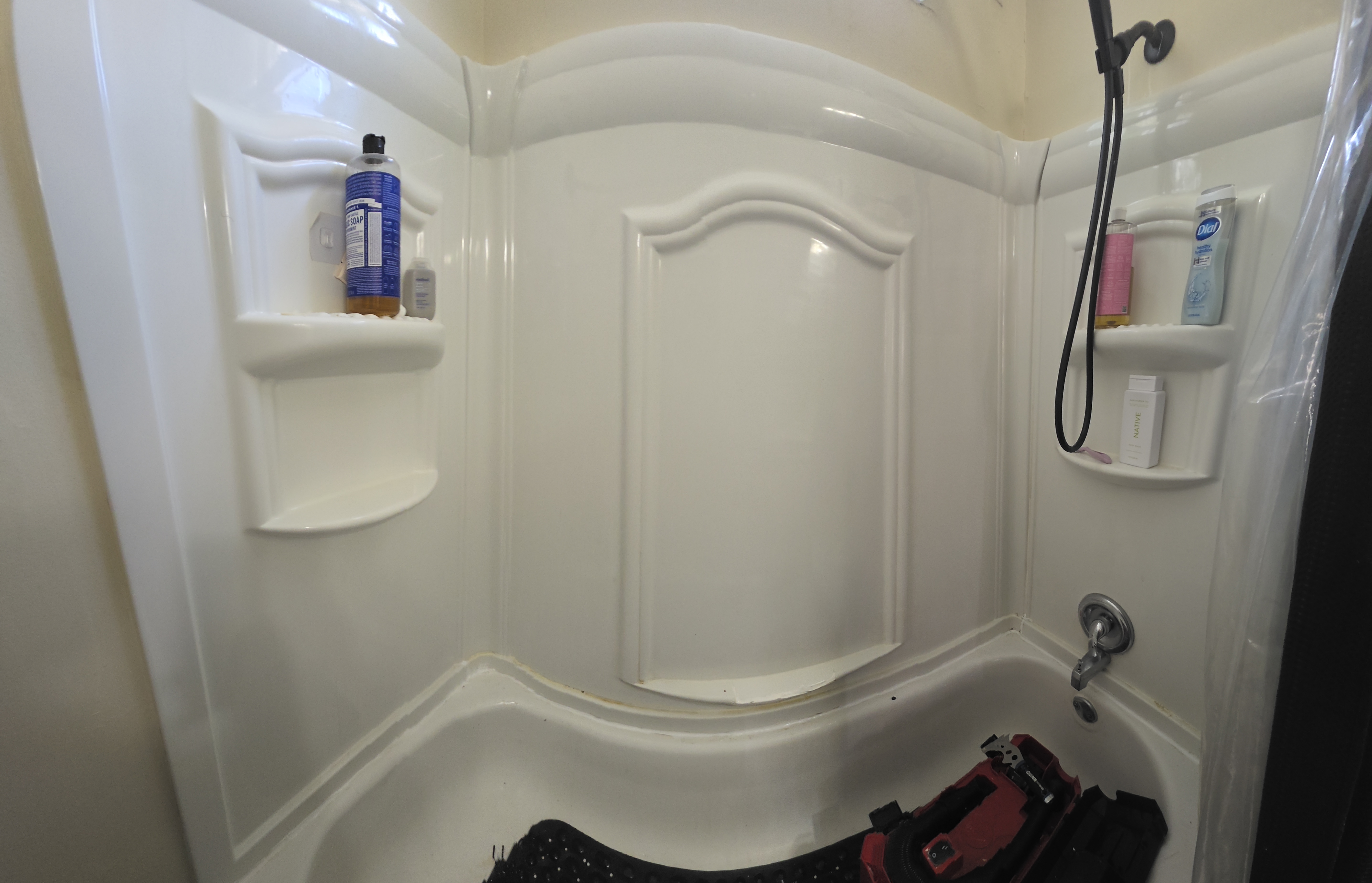 Clean fresh caulk bead after shower recaulk