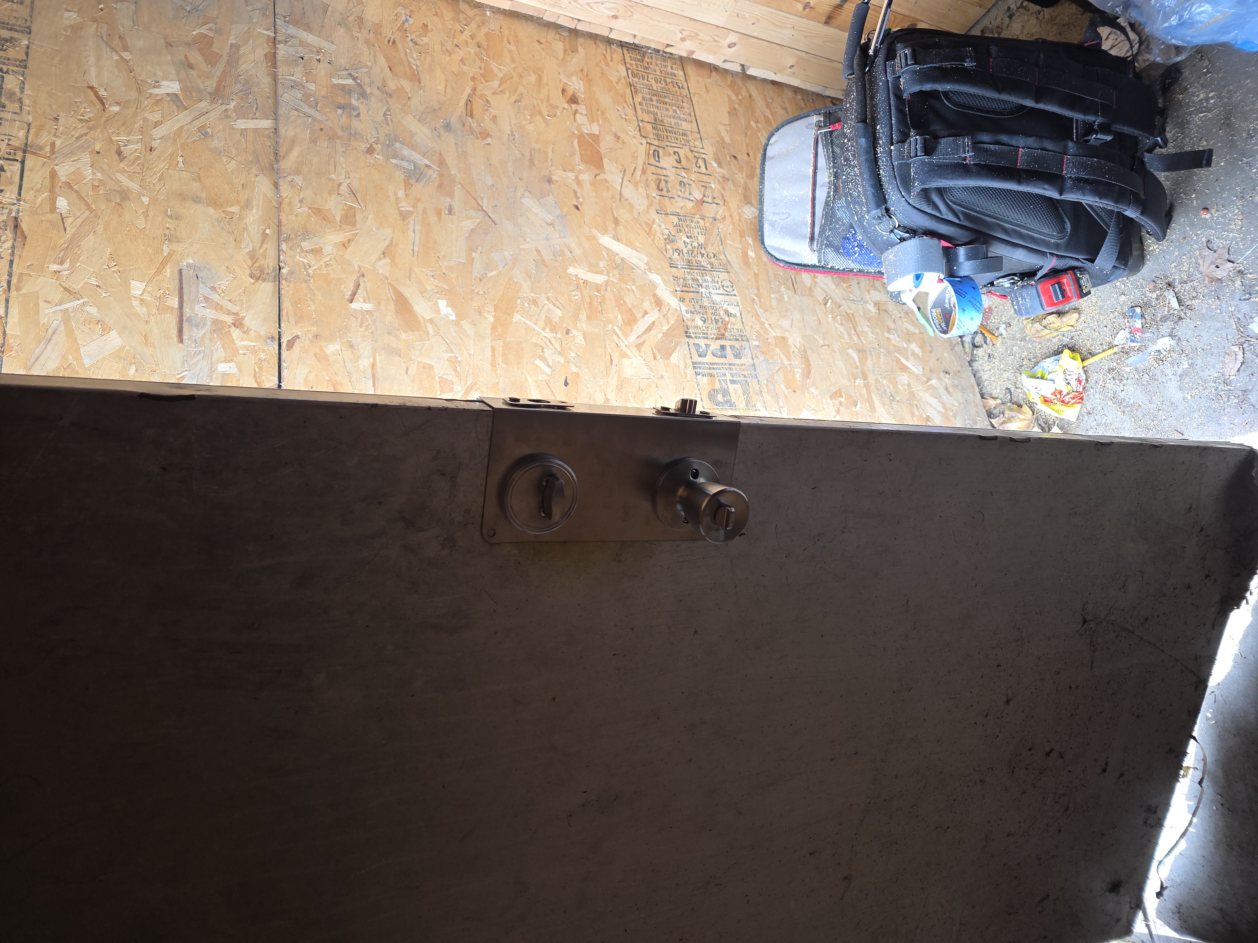 Door with new lockset installed after repair
